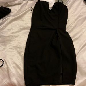 Black mini dress, hard v wired.